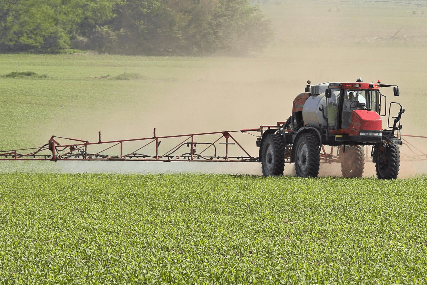 sprayer in iowa corn field